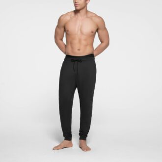 HERRE UTENDØRSJERSEY TAPERED JOGGERBUKSE