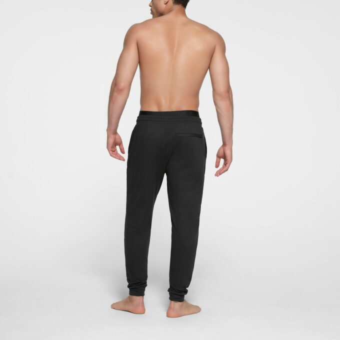 HERRE UTENDØRSJERSEY TAPERED JOGGERBUKSE