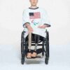 SKIMS FOR TEAM USA PARALYMPISK T-SKJORTE I BOMULL MED RIBBEDE PARALYMPISKE SPILL, MINIKJOLE