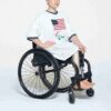 SKIMS FOR TEAM USA PARALYMPISK T-SKJORTE I BOMULL MED RIBBEDE PARALYMPISKE SPILL, MINIKJOLE