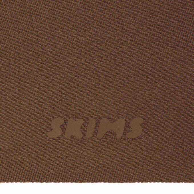 SKIMS ULTIMATE BODY PUSHUP THONG-BODYSUITT